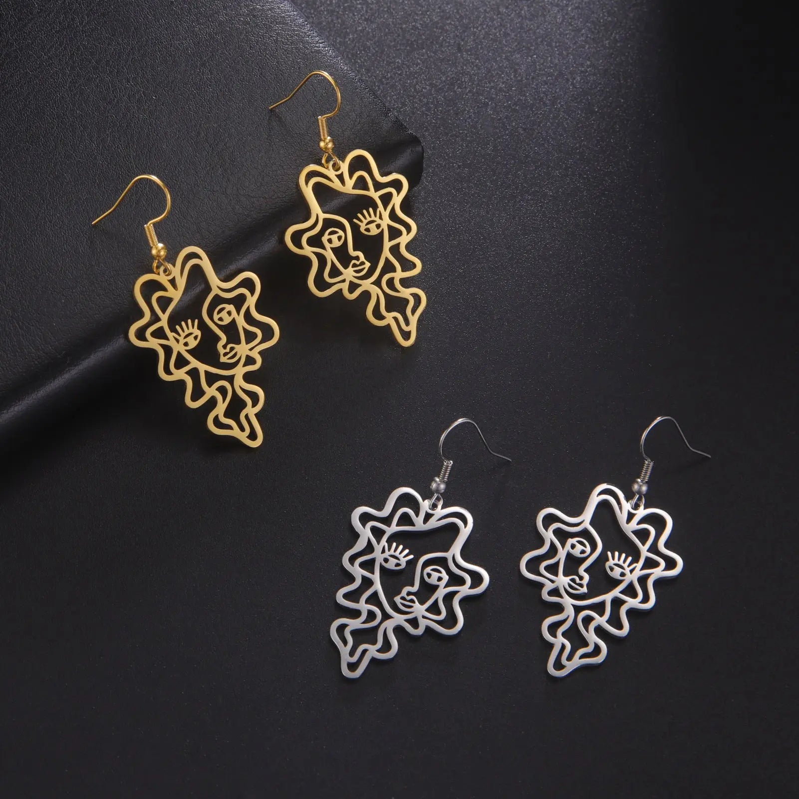 Titanium Steel Retro Ethnic Style Wave Girl Earrings gomuto.com