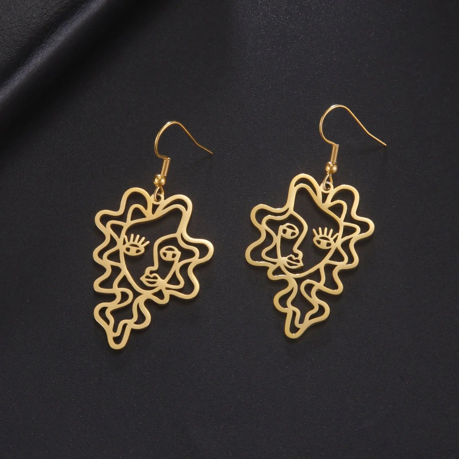 Titanium Steel Retro Ethnic Style Wave Girl Earrings gomuto.com
