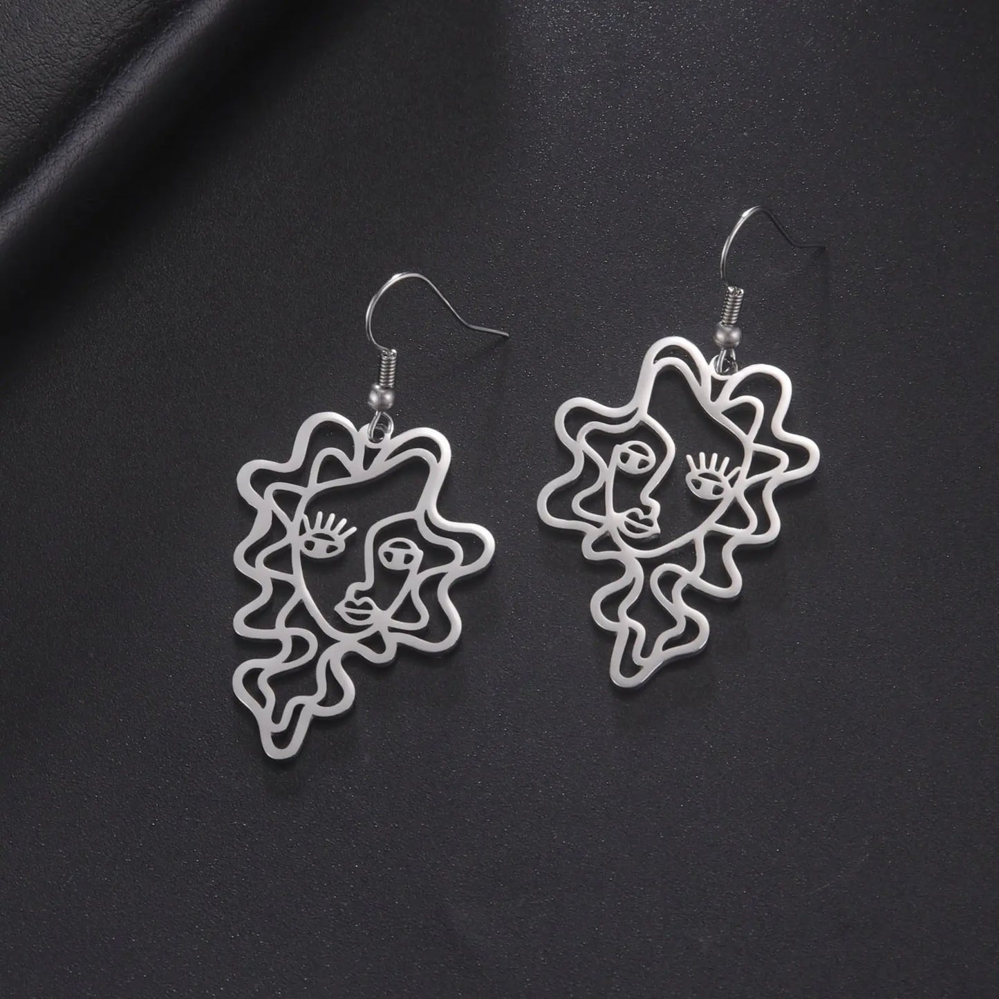 Titanium Steel Retro Ethnic Style Wave Girl Earrings gomuto.com