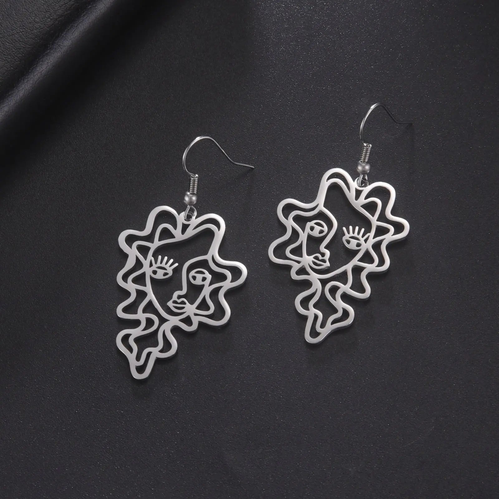 Titanium Steel Retro Ethnic Style Wave Girl Earrings gomuto.com