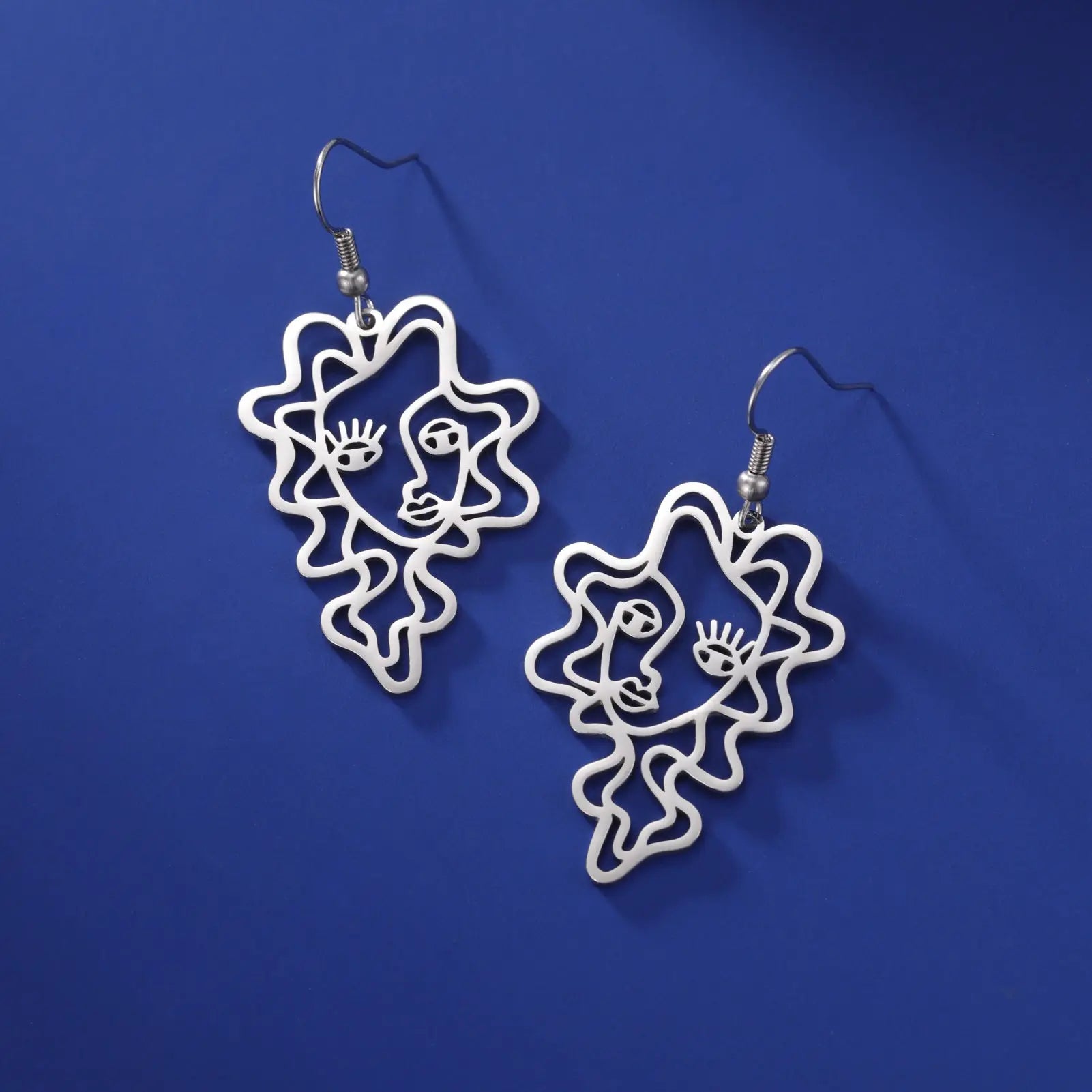 Titanium Steel Retro Ethnic Style Wave Girl Earrings gomuto.com